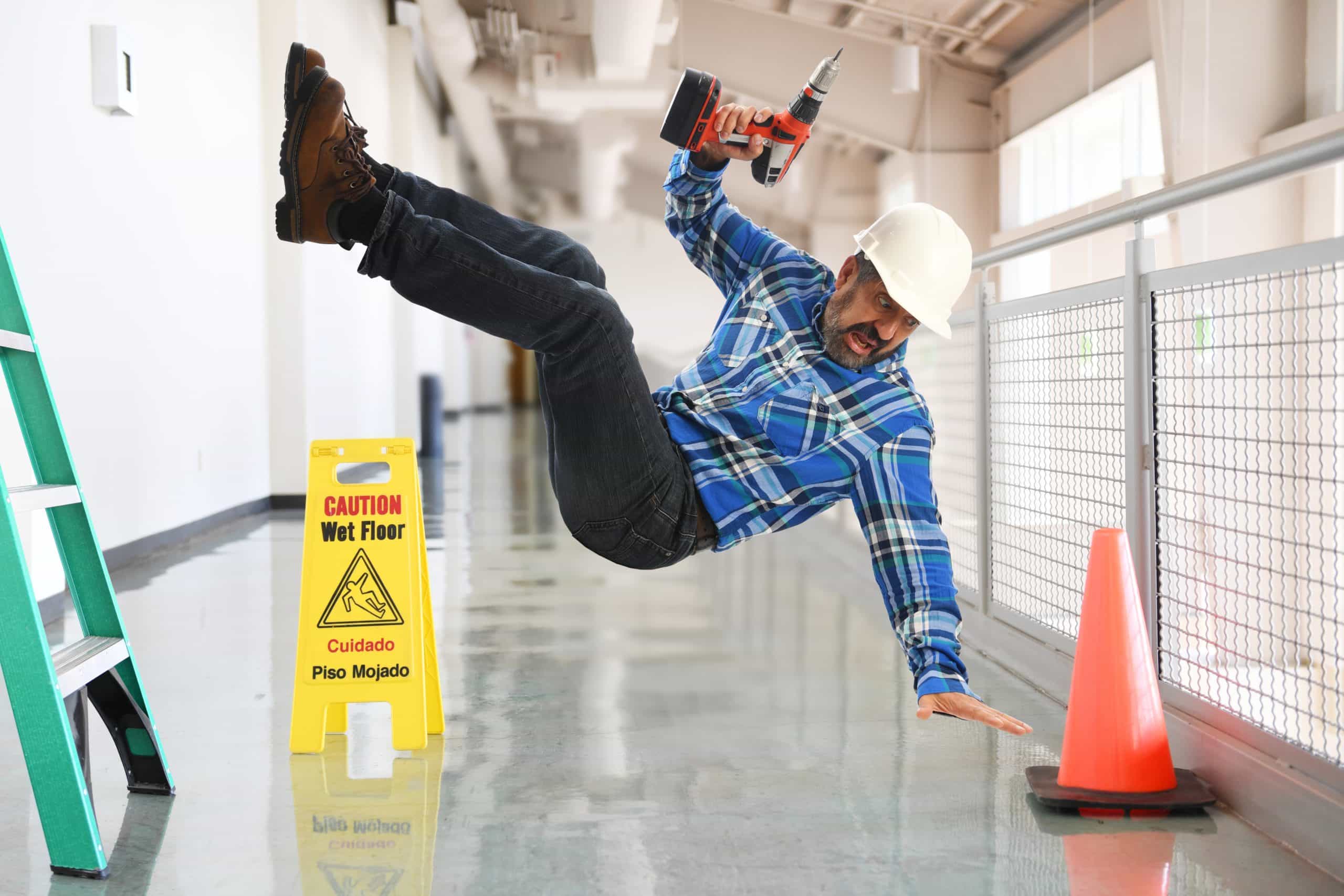 A construction working falling from a ladder, h&s software | Be-Safe